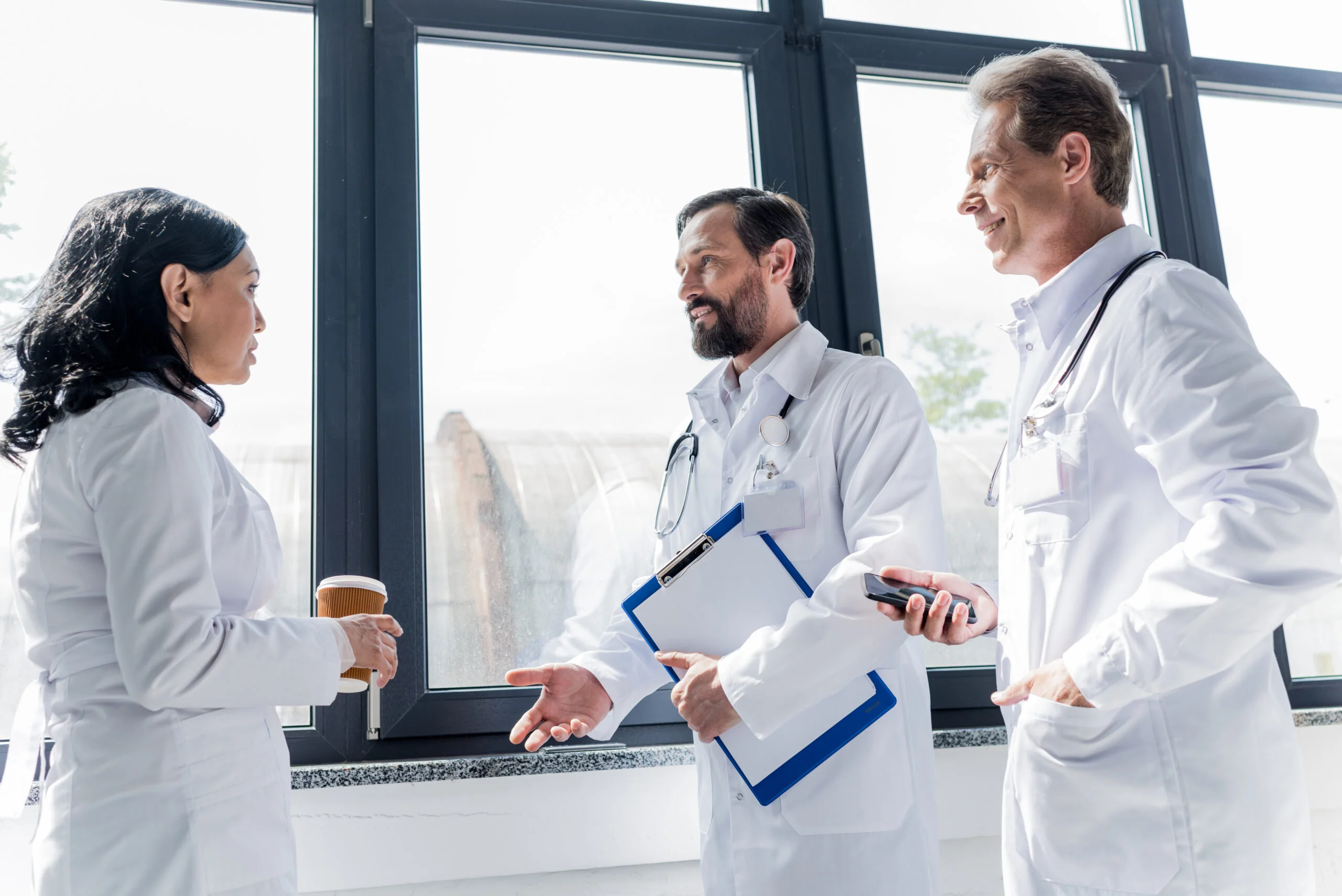 group-of-professional-doctors-talking-and-drinking-2024-11-17-19-51-06-utc-scaled group-of-professional-doctors-talking-and-drinking-2024-11-17-19-51-06-utc-scaled